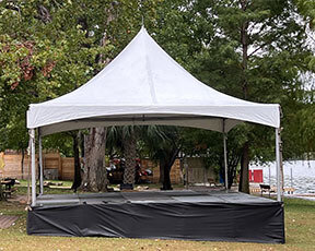 Bil-jax stage with 20x20 tent 